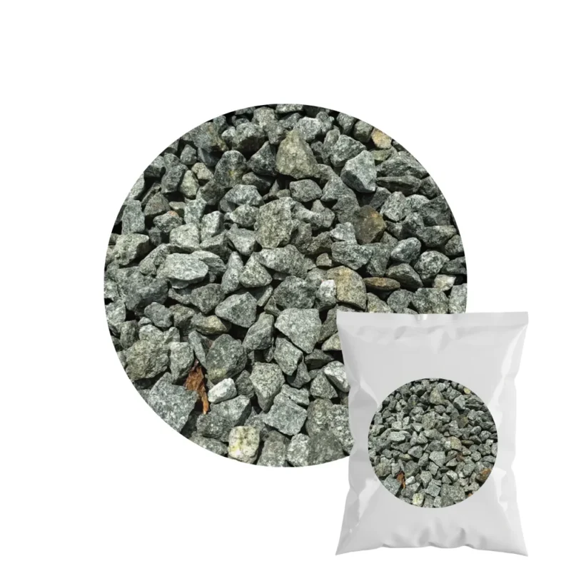 Polybag of dark green basalt chippings, a durable decorative stone for modern gardens and landscaping.